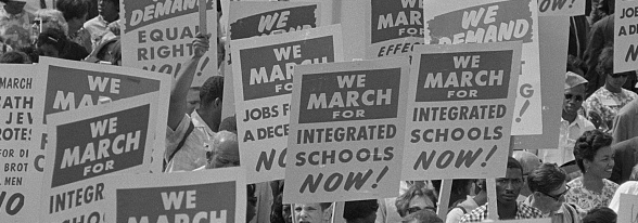 A sea of signs reading We March for Integrated Schools Now! and We Demand Equal Rights Now! carried by marchers during the March on Washington in 1963. Photo by Marion
S. Trikosko.