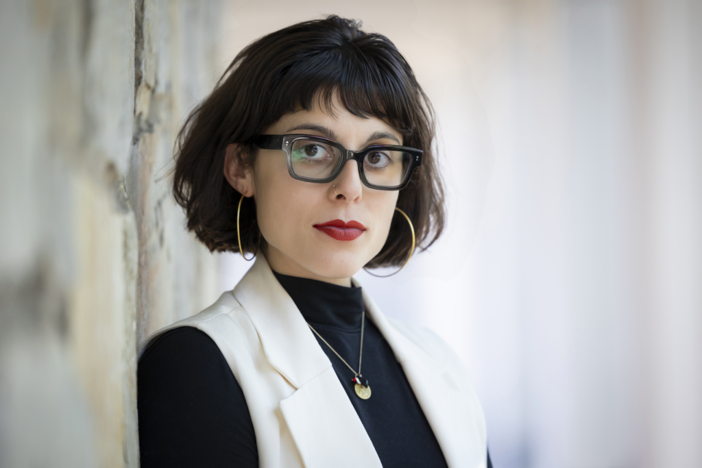 Headshot of Sarah Medina Camiscolli.